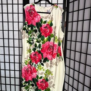 Woman’s floral sleeveless beautiful dress. New condition with tags attached